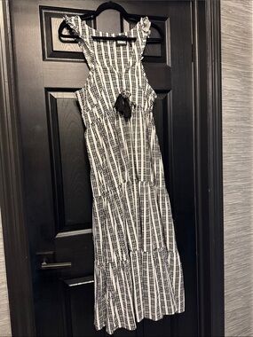 Reclaimed Vintage Black & White Striped Tiered Maxi Dress with Tassel